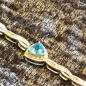 7" Sterling Silver 925 Blue Topaz Bracelet. Trilliant cut. 9.3g.